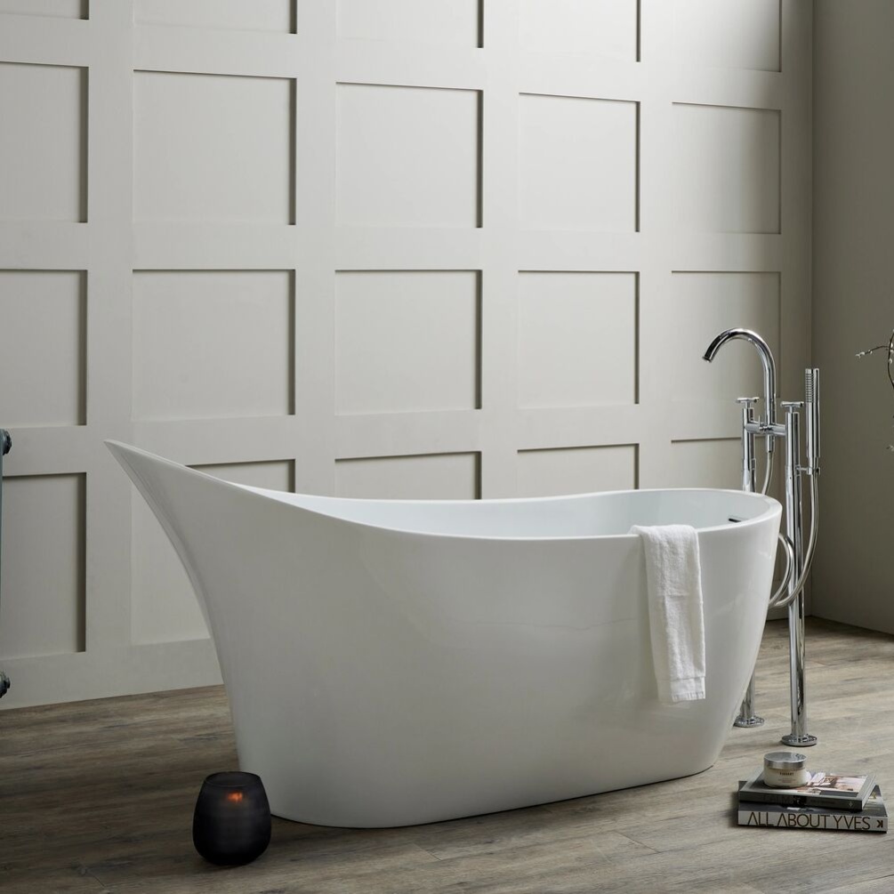 Product lifestyle image of Tignes Slipper Bath SB217 next to square panelled wall